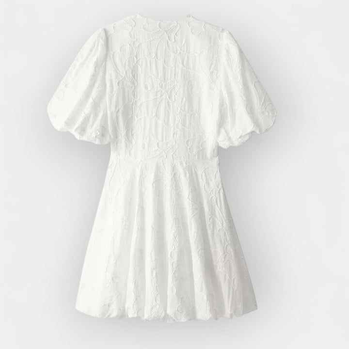 Elisa | Erdvi balta suknelė